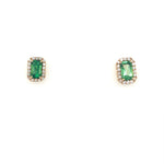 Emerald cut Tsavorite with diamond frame set in yellow gold